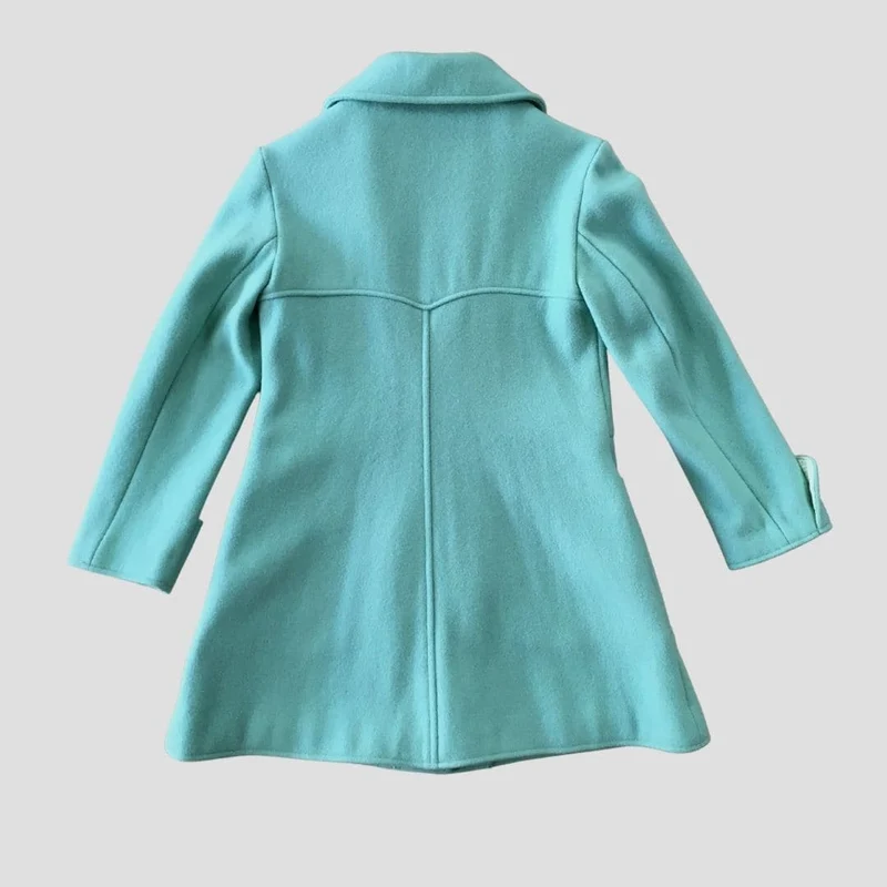 Manteau vert d'eau au zip blanc - Seconde main
