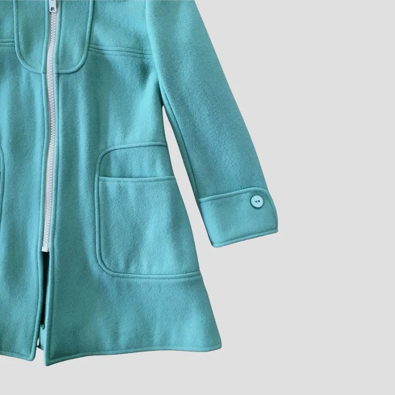 Manteau vert d'eau au zip blanc - Seconde main