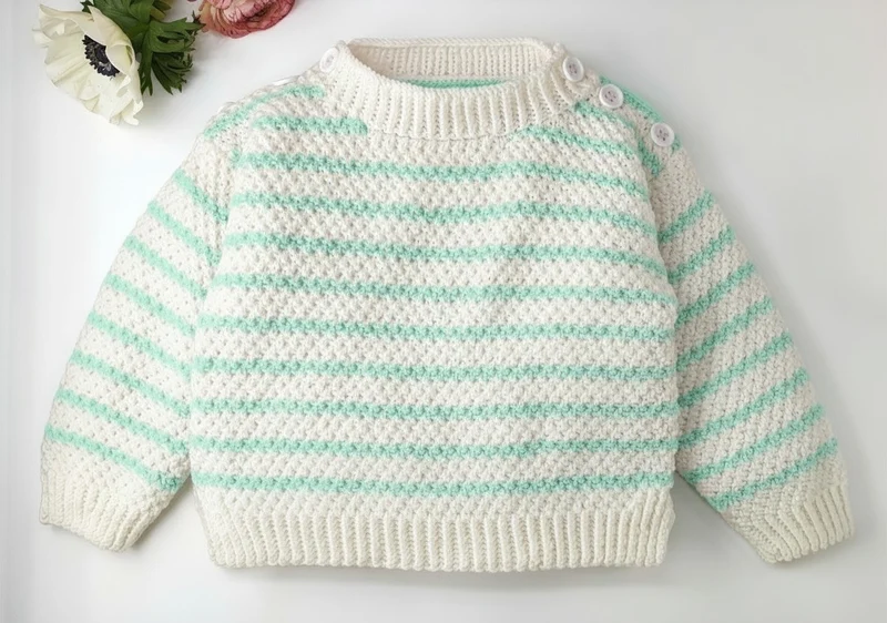 Pull bébé Jacinthe à tricoter