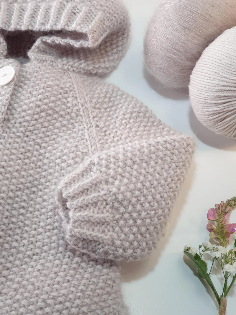 Poncho bébé Cèdre à tricoter.