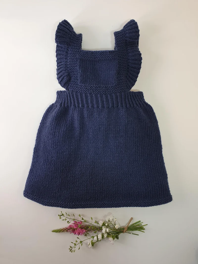 Robe bébé Hiba à tricoter.