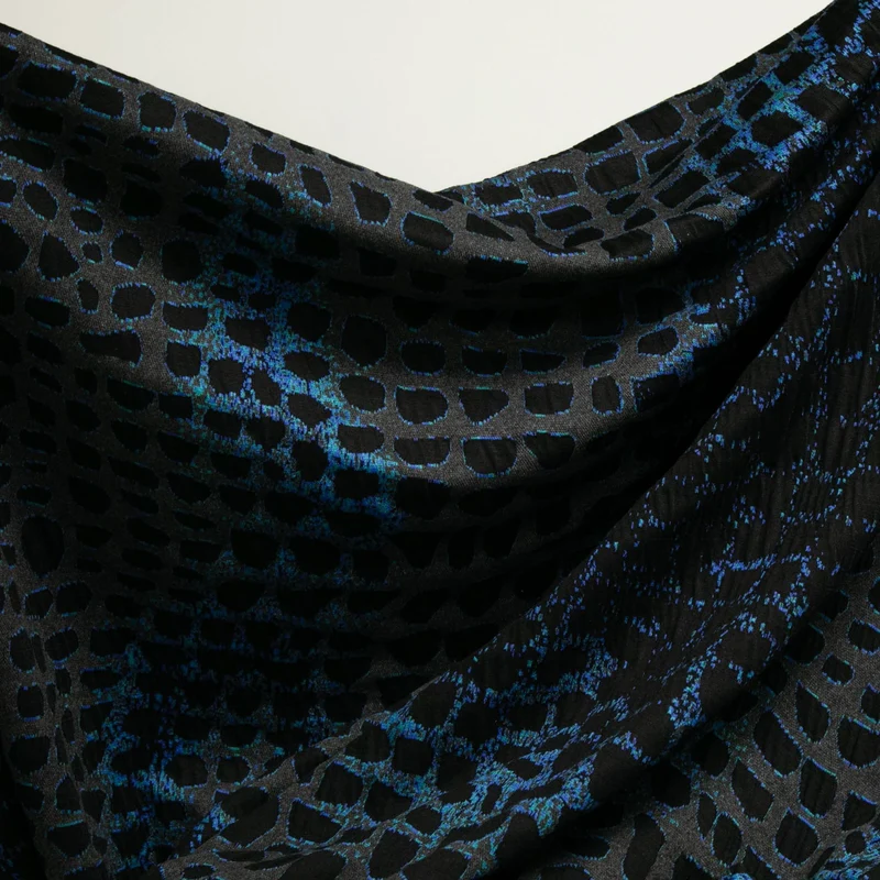 Jacquard tricoté motif reptile | Noir & bleu | Deadstock de designer Nadya Toto