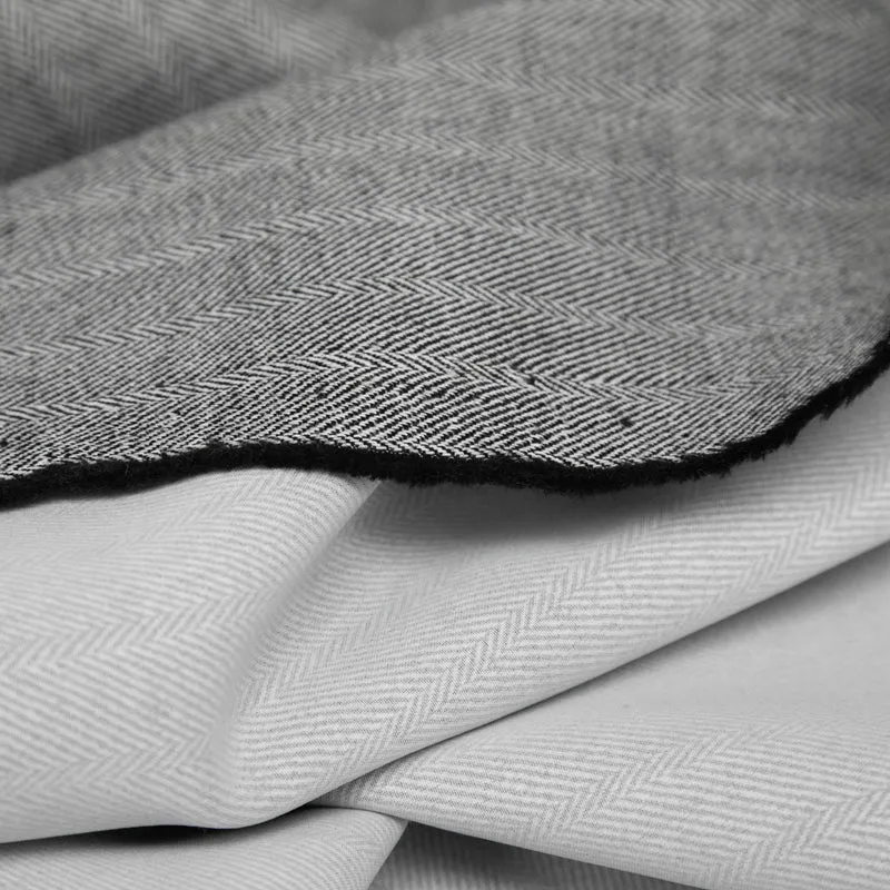 Tissu pour manteau en mélange de laine | Chevrons noir & ivoire