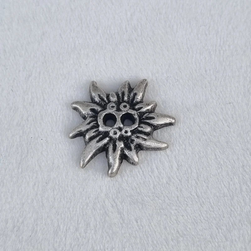 Boutons 2 trous métal edelweiss argent 20 mm