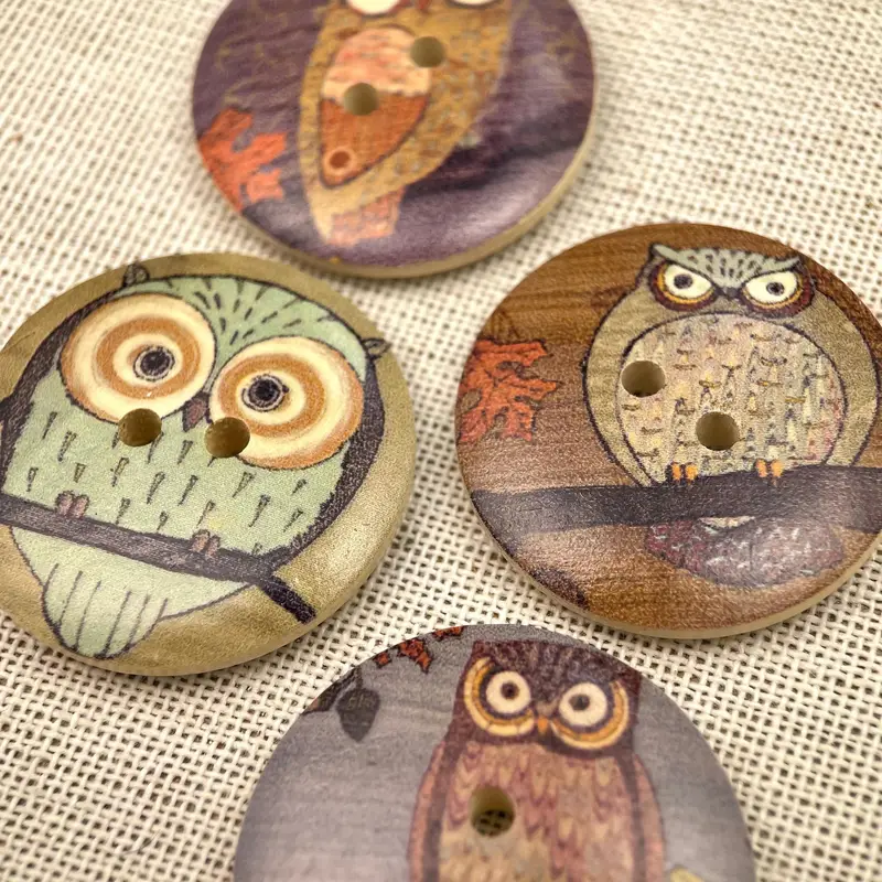 Boutons 30 mm en bois illustrés d'oiseaux assortie