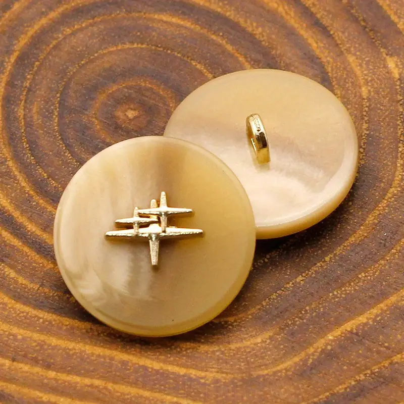 Boutons 25 mm imitation résine de couleur beige