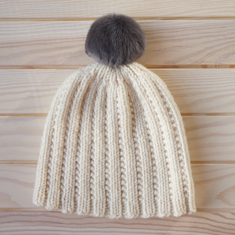 gros pompon en fourrure de lapin